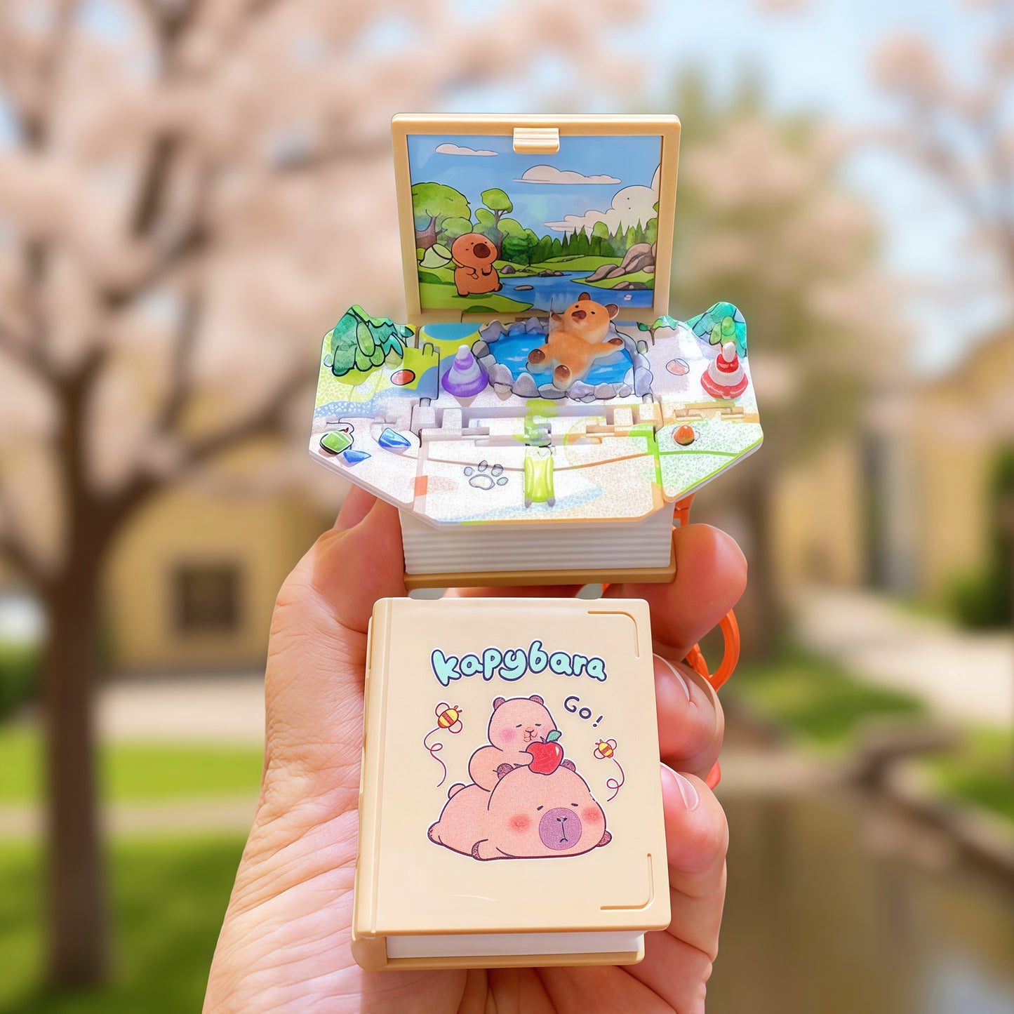 Funny Novelty 3D Pop-Up Book Bag Charms Keychain, Folding Mini Scene Keyring Bag Decoration, Birthday Gift for Girls Boys Children, Capybara Football Lover Design