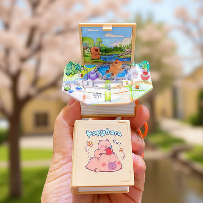 Funny Novelty 3D Pop-Up Book Bag Charms Keychain, Folding Mini Scene Keyring Bag Decoration, Birthday Gift for Girls Boys Children, Capybara Football Lover Design